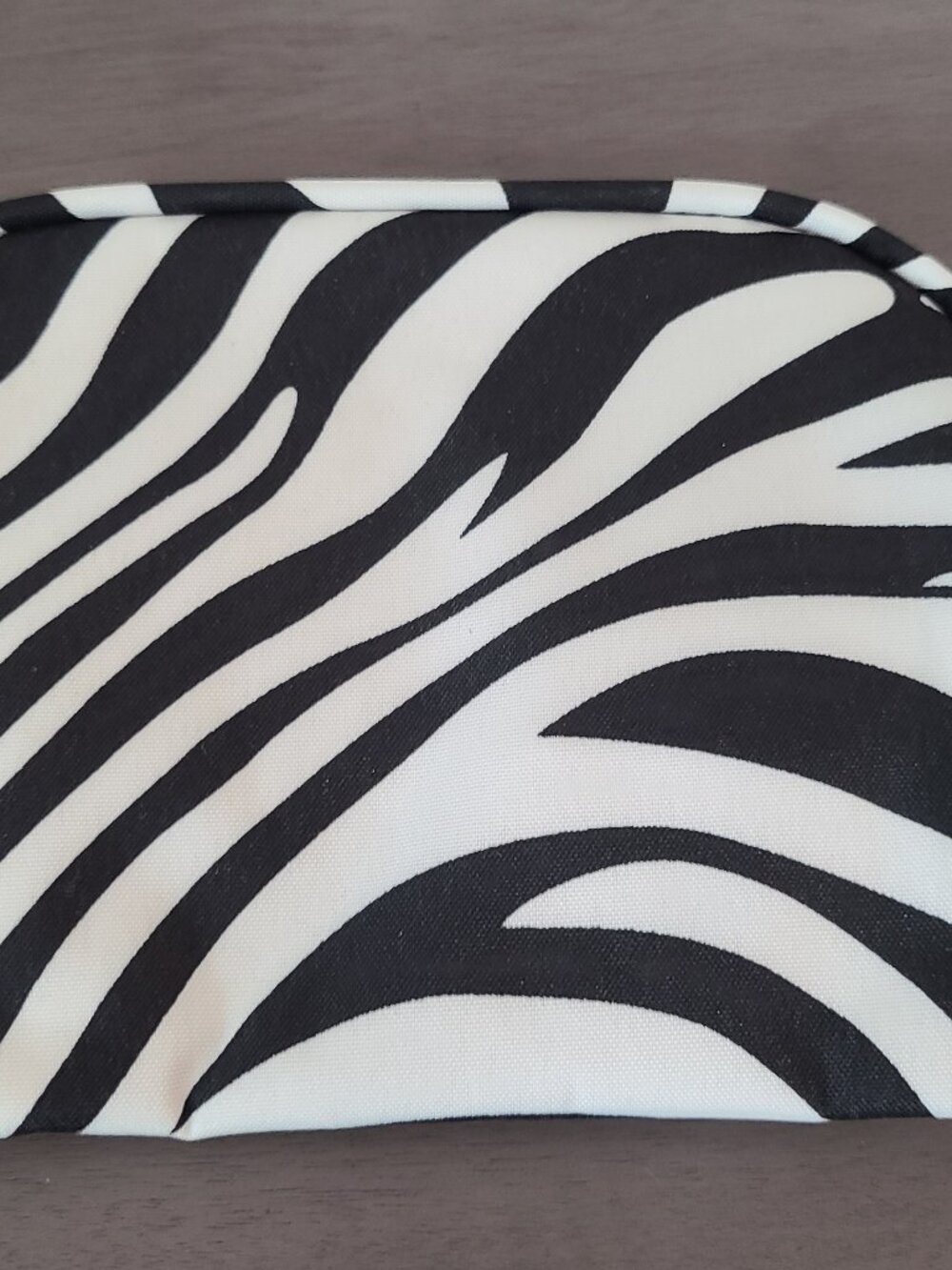 You get 3 Black Zebra Cosmetic Bags